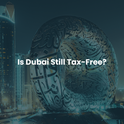 Dubai skyline with Museum of the Future and text asking “Is Dubai Still Tax-Free?” highlighting UAE tax trends.